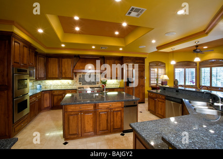 Illuminated kitchen in residence Stock Photo