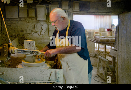 Craftsman making pottery at the famous  Bybee Pottery in Bybee Kentucky Stock Photo