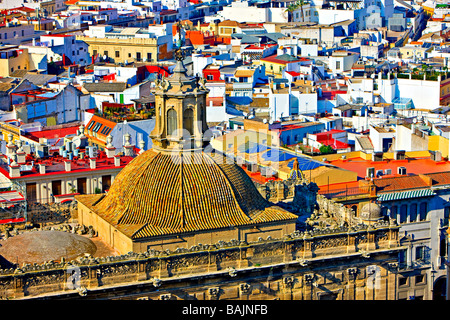 Dome of Iglesia del Sagrario (church) in the grounds of the Seville Cathedral,and a view of the city from La Giralda. Stock Photo