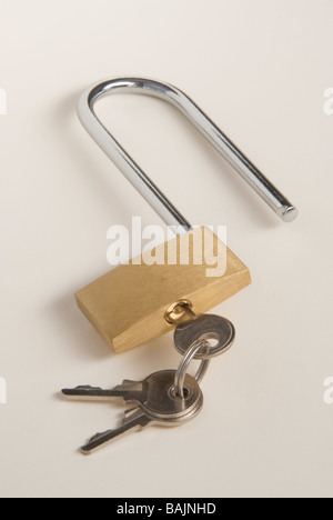 Unlocked padlock with keys Stock Photo