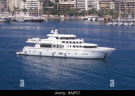 Luxury superyacht Johnson 105 ( 32 mtrs 'White Shark' )   passing Paseo Maritimo, Palma de Mallorca Stock Photo