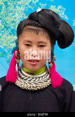 China, Guizhou Province, around Congjiang, Black Miao ethnic group, portrait of a young woman with traditional outfit Stock Photo