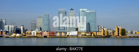 Skyscraper landmark offices and riverside apartments in the Canary Wharf development area in London Docklands on River Thames on the Isle of Dogs Stock Photo