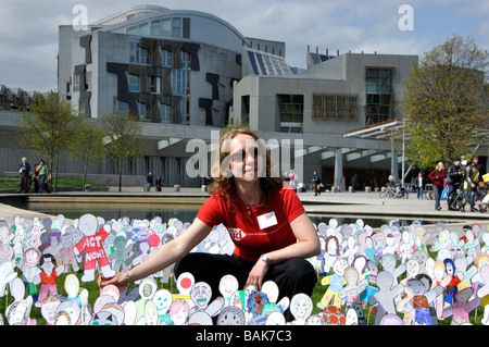 Claire Aston from Christian Aid makes a point about climate change outside the Scottish Parliament, Edinburgh (editorial only). Stock Photo