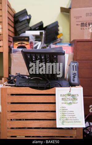 Electronics recycling bin at a recycling center within a neighborhood business, Brooklyn, New York, USA Stock Photo