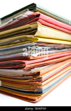 stack of stuffed file folders in various colors Stock Photo