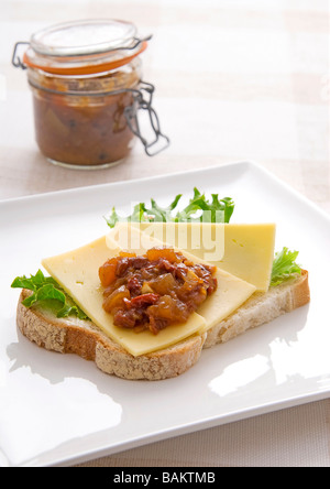 Apricot and Almond Chutney on an open cheese sandwich Stock Photo