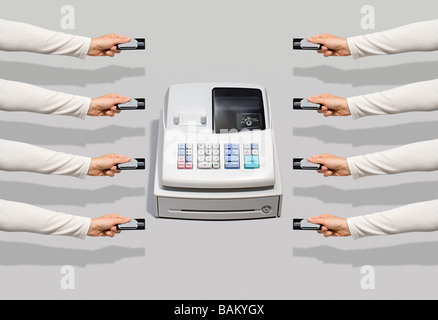 Cash register and people with credit cards Stock Photo