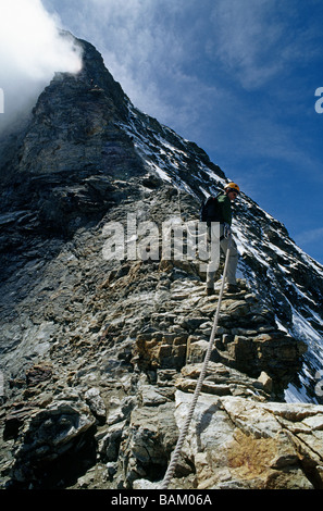 Rock climbing - Abseiling - Switzerland Stock Photo - Alamy