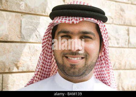 Portrait of a young man wearing a gutra Stock Photo