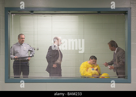 Man in chicken suit in police interview Stock Photo