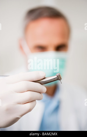 Dentist with drill Stock Photo