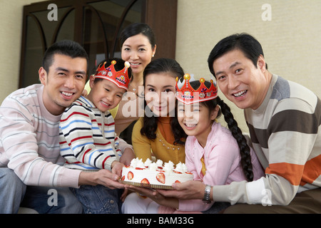 Family Celebrating A Birthday Stock Photo