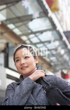 Portrait Of Woman Looking Into The Distance Stock Photo