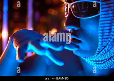 Close-Up Of Futuristic Man Wearing Sunglasses Stock Photo