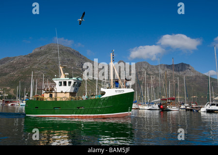 Fish trawler leaving Hout Bay Harbour Western Cape South Africa Stock Photo