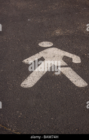 painted sign indicating pedestrian walkway in Rome, Italy. Stock Photo