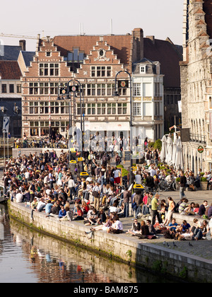 Crowds of people at the riverside of Graslei,Ghent Stock Photo