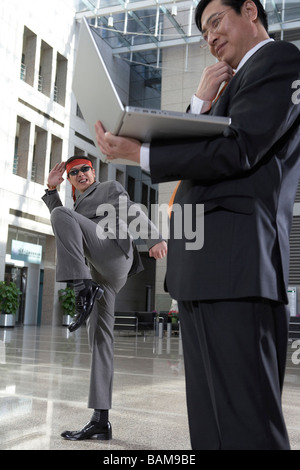 Businessmen Practicing Karate Stock Photo