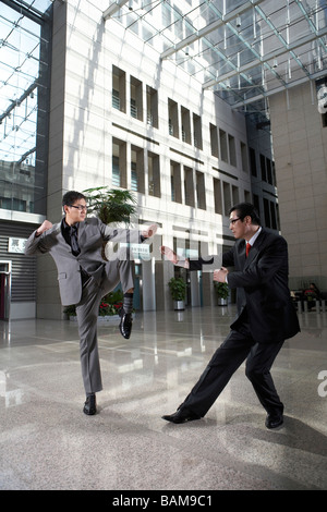 Businessmen Practicing Karate Stock Photo