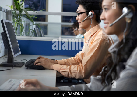Businesspeople Using Computer Stock Photo