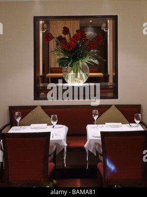 Mju Restaurant- Millennium Hotel, London, United Kingdom, United Designers, Mju restaurant- millennium hotel tables with vase Stock Photo