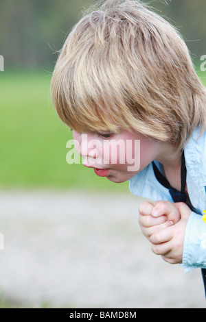 potrait of a two years old boy outdoors Stock Photo