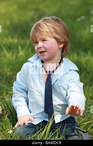 potrait of a two years old boy outdoors Stock Photo