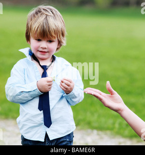 potrait of a two years old boy outdoors Stock Photo