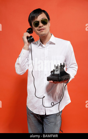 Young Man Talking On Telephone Stock Photo