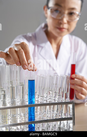 Scientist With Test Tubes Stock Photo