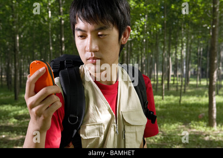 Man Looking At GPS System Stock Photo