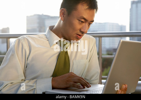 Businessman Working On Laptop Stock Photo