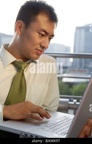Businessman Working On Laptop Stock Photo
