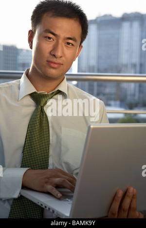 Businessman Working On Laptop Stock Photo