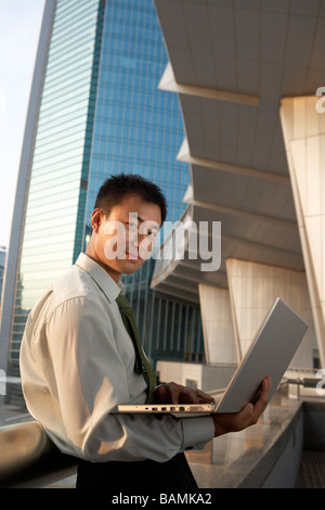 Businessman Working On Laptop Stock Photo