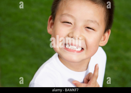Young Boy Playing Ping Pong Stock Photo