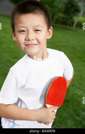 Young Boy Playing Ping Pong Stock Photo