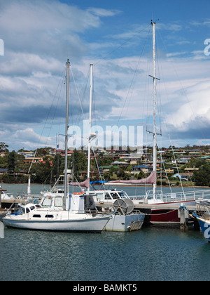 HARBOUR AND MOORINGS ON PIER,  AT ST HELENS TASMANIA AUSTRALIA Stock Photo