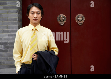 Businessman Standing Outside The Forbidden City In Beijing Stock Photo