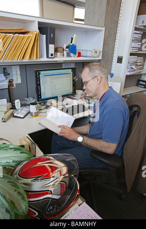 Worker in Law Library at University of Chicago Stock Photo