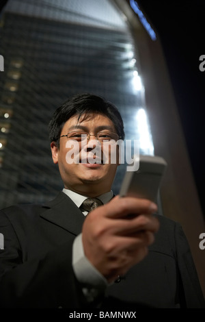 Businessman Using Cellphone Stock Photo