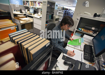 Worker in Law Library at University of Chicago Stock Photo