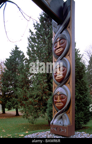 Carved Coast Salish Totem Gateway in Autumn at Brockton Point in Stanley Park Vancouver British Columbia Canada Stock Photo