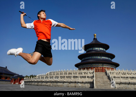 Portrait Of Badminton Player In Front Of Temple Stock Photo