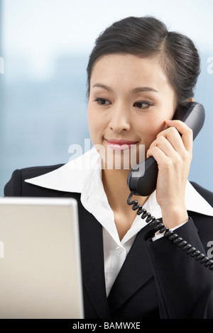 Businesswoman Talking On Phone Stock Photo