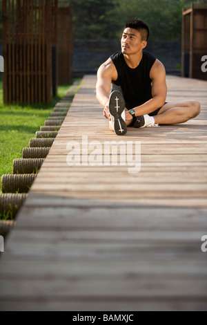 Man Doing Stretches Stock Photo