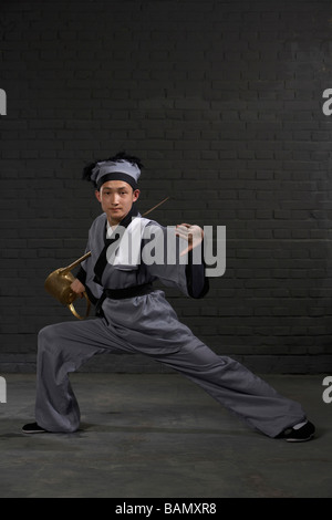 Tradtional Chinese waiter Stock Photo