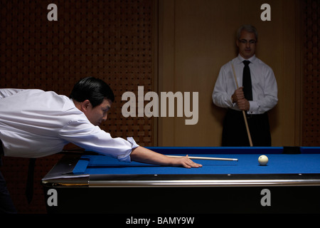 Two professionals play billiards Stock Photo