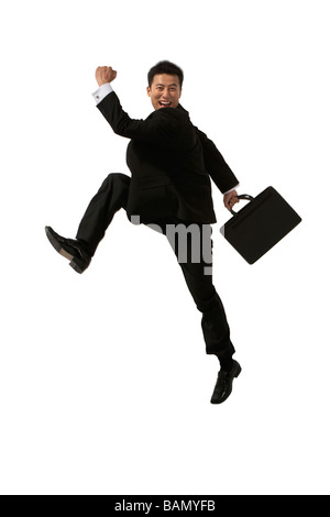 An ecstatic worker on the go Stock Photo